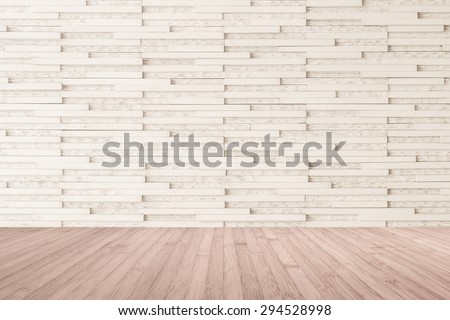 Modern marble tile wall pattern background in light cream beige color with wooden floor in red brown tone : Horizontal marble rock stone tiled pattern texture backdrop with wood flooring