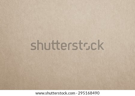 Recycled craft paper textured background in sepia cream brown color tone: Detailed texture of recycled paper fiber