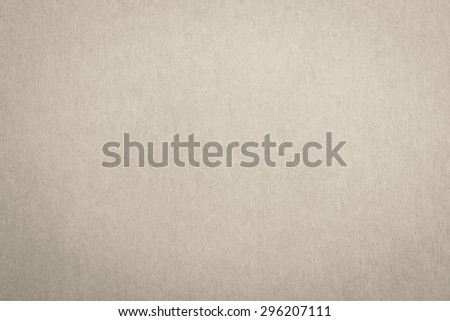 Recycled craft paper textured background in sepia brown color tone: Detailed texture of recycled paper fiber