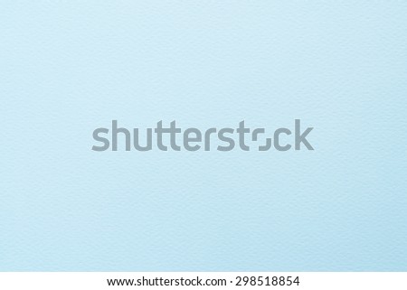 Pastel light blue color tone water color paper texture: Water colour paper textured background in light blue tone