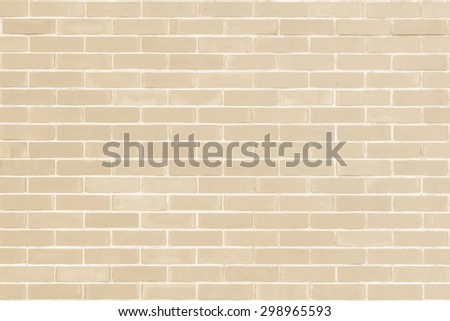 Brick wall texture pattern background in natural light ancient cream beige yellow brown color tone: Masonry brick work wall detail textured backdrop