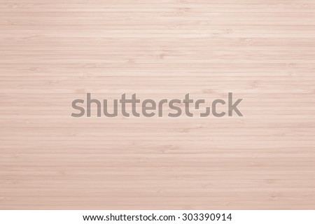 Wooden textured grainy detail backdrop in light red brown color tone: Bamboo wood laminated board detailed texture pattern background in red brown toned colour