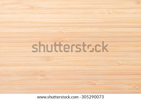 Wooden textured grainy detail backdrop in natural light yellow cream beige brown color tone: Bamboo wood laminated board detailed texture pattern background in creme beige toned colour
