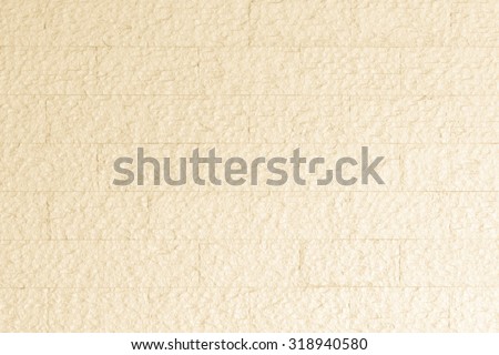 Limestone rock slab tile wall texture patterned background in light pastel cream yellow beige color tone: Rustic aged rough matte  marble slate wall textured detail backdrop in creme toned colour