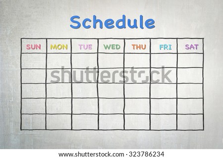 Freehand pen doodle sketch drawing of blank monthly grid timetable schedule on grunge grey cement wall background: Hand drawn study plan on concrete wall with weekly date in colorful pastel color