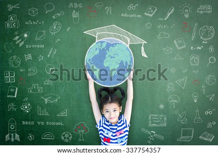 School girl kid lifting world map globe w/ freehand chalk doodle drawing of graduation cap on green chalkboard background celebrating educational success: Children education and world literacy concept