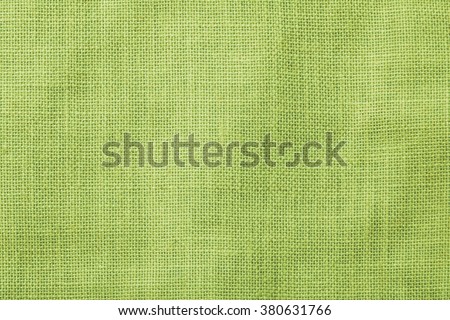 Sackcloth woven texture pattern background light green earth color tone: Eco friendly raw organic flax sack cloth fabric textile backdrop: Bag rope thread detailed textured burlap canvas