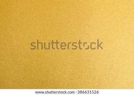 Shiny hot yellow gold golden color decorative texture paper: Bright brilliant festive glossy metallic look textured empty wallpaper backdrop: Aluminium tin metal material for craft design decoration