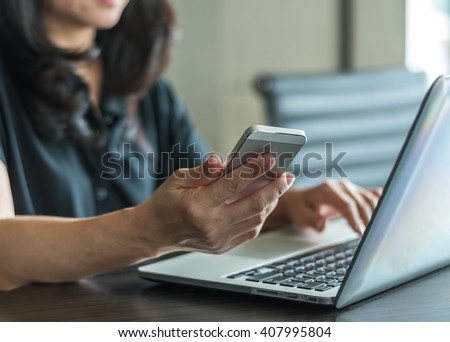 City lifestyle woman hands working on home office computer typing on laptop keyboard using IOT IT SEO wifi cyber internet online digital media technology pc device in urban view indoor environment