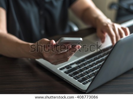 City lifestyle woman hands busy working on computer typing laptop keyboard using IOT IT SEO wifi cyber internet online digital media technology pc device in urban office space environment indoor