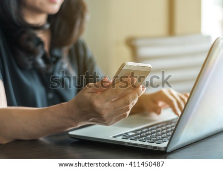 Vintage style city lifestyle woman hands working home office computer typing on laptop keyboard using IOT IT SEO wifi cyber online digital media technology pc device in urban view indoor environment