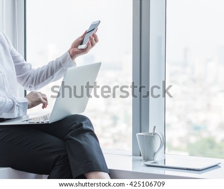 City lifestyle journalist blogger woman person working on computer device, smart phone texting in home office: Hand keyboard typing wifi cyber IT IOT IM PPC 4G communication technology daily life seo