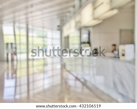 Blur abstract background reception hall customer or patient counter service & cashier desk indoor space in hospital office hotel bank interior: Blurry perspective view information lobby staff working