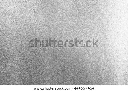 Shiny silver white grey gray paper foil decorative texture background: Bright brilliant festive glossy metallic look textured backdrop:  Metal steel like material pattern surface for design decoration