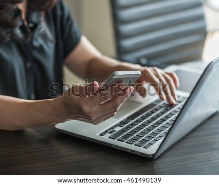 City lifestyle woman hands working on computer typing laptop keyboard using UI IM IOT IT SEO 4G 5G wifi cyber internet online digital media interactive technology pc device in office space environment