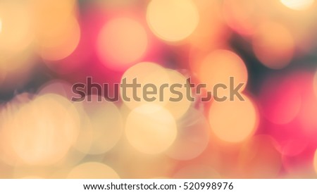 Blur abstract background merry christmas party celebration xmas tree night light bokeh in warm green red yellow orange white sweet tone: Blurry view happy holiday enjoy joy world nightlife concept