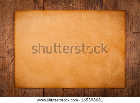 Empty rustic style paper on wooden background, concept
