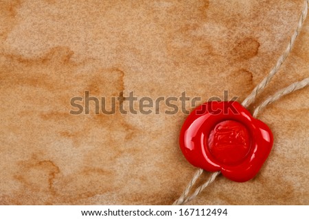 Dirty sheet of old paper with wax seal stamp