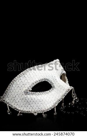 Silver glittering Venice mask and black pearls