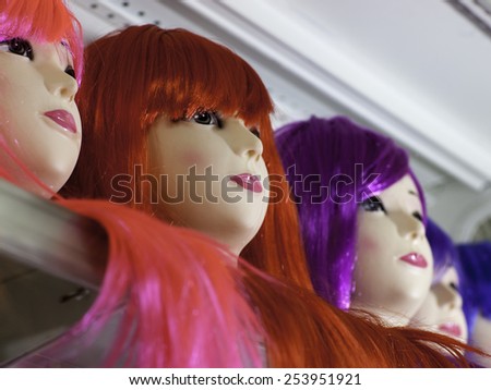 Dolls with unquieting coloured wigs