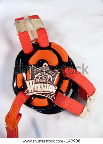 wrestling head gear and medal