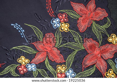 Bark Blue Kebaya Cloth With intricate embroidery of Red Flowers