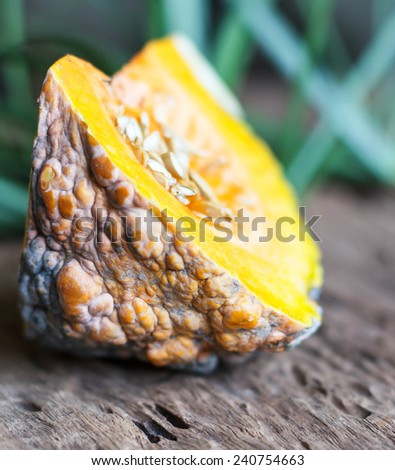 Fresh Pumpkin on Wood Table, Concept and Idea of Food Rustic Style.