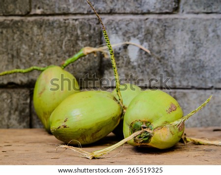 Coconut - Tropical green coconuts opened,dark tone