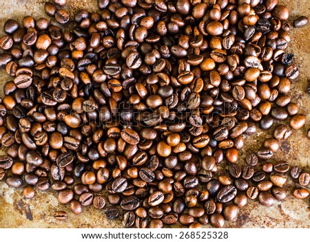 Roasted brown coffee beans, can be used as a background and texture