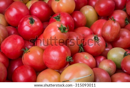 cherry tomatoes on market ,background texture