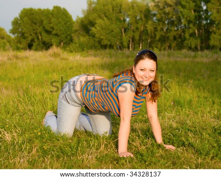 attractive young woman on all fours stay