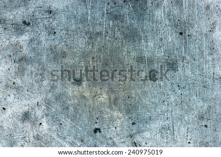 Old metal surface with scratches and stains the sheets.