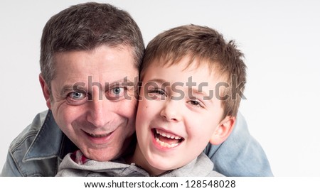 Closeup Portrait of a happy father and son together