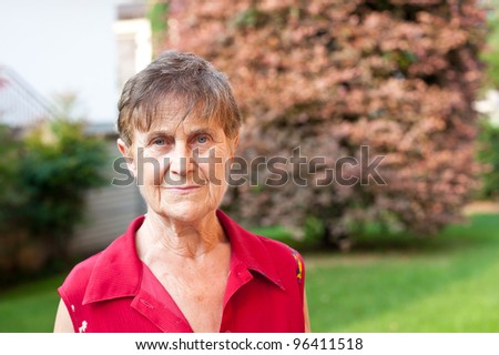 portrait of senior woman in the spring garden