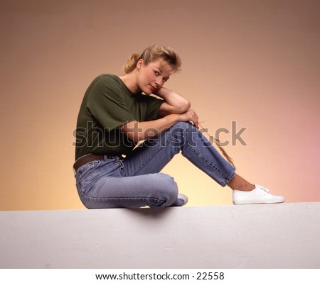 stock photo : Woman Sitting with elbows on knees