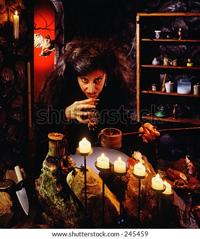 Witch at cauldron casting spell