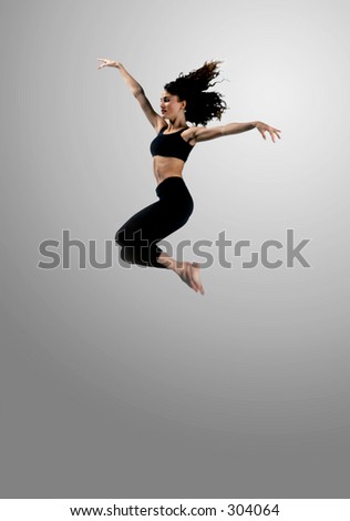Dancer in tuck jump