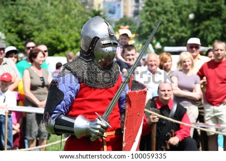 WARSAW, POLAND - JUNE 6: Struggle medieval knight during XV Knight Tournament on June 6, 2010 in Warsaw, Poland. Knight ready to take the fight in a tournament match.