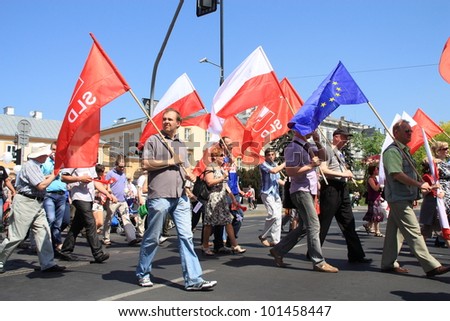 WARSAW - MAY 1: First of May parade participants during International Workers Day (Labor Day), on May 1, 2012 in Warsaw, Poland.