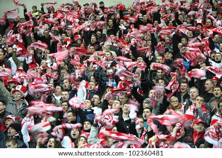 WARSAW, POLAND - FEBRUARY 29: Polish football fans during the friendly football match between Poland vs Portugal on February 29, 2012 in Warsaw, Poland. Final results: Poland - Portugal 0:0