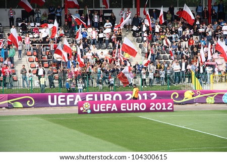 WARSAW, POLAND - JUNE 3: Polish fans before the official training of the Polish national football team, on June 3, 2012 in Warsaw, Poland. 5 days before the opening match of Euro 2012 Poland - Greece