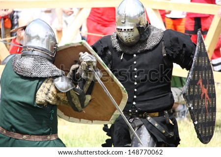 WARSAW, POLAND - JUNE 23: Knights duel during Fire and Steel Olympics on June 23, 2013 in Warsaw, Poland.