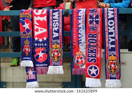 KRAKOW, POLAND - OCTOBER 6: Scarves fanatical supporters Wisla Krakow during the football match between Wisla Krakow and Legia Warsaw, 1:1 on October 6, 2013 in Krakow, Poland.