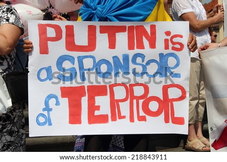 WARSAW, POLAND - JULY 27, 2014: The pro-Ukrainian protest against policy of the President of Russia Vladimir Putin.