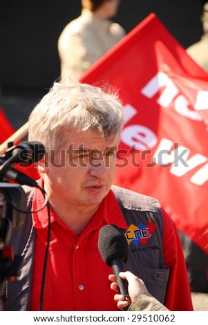 WARSAW, POLAND - MAY 1: Piotr Ikonowicz, leader of the polish New Left party gives interview during the Labor Day demonstration May 1, 2009 in Warsaw.