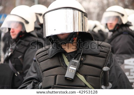 WARSAW, POLAND - DECEMBER 15: Closeup of a police protecting government buildings during anti government Solidarity demonstration on December 15, 2009 in Warsaw, Poland.