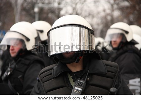 WARSAW, POLAND - DECEMBER 15: Closeup of a police protecting government buildings during anti government Solidarity demonstration on December 15, 2009 in Warsaw, Poland.