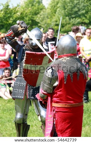 WARSAW, POLAND - JUNE 6: Struggle medieval knights during XV Knight Tournament on June 6, 2010 in Warsaw, Poland.