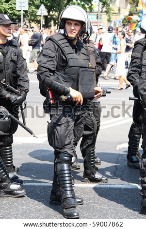 WARSAW, POLAND - JULY 17: Police protect people taking part in Europride to support gay rights, on July 17, 2010 in Warsaw, Poland.