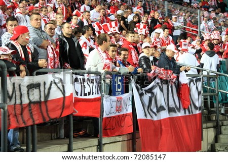 CHORZOW - SEPTEMBER 5: Polish fans during the 2010 FIFA World Cup qualifying match between Poland and Northern Ireland on September 5, 2009 in Chorzow, Poland.